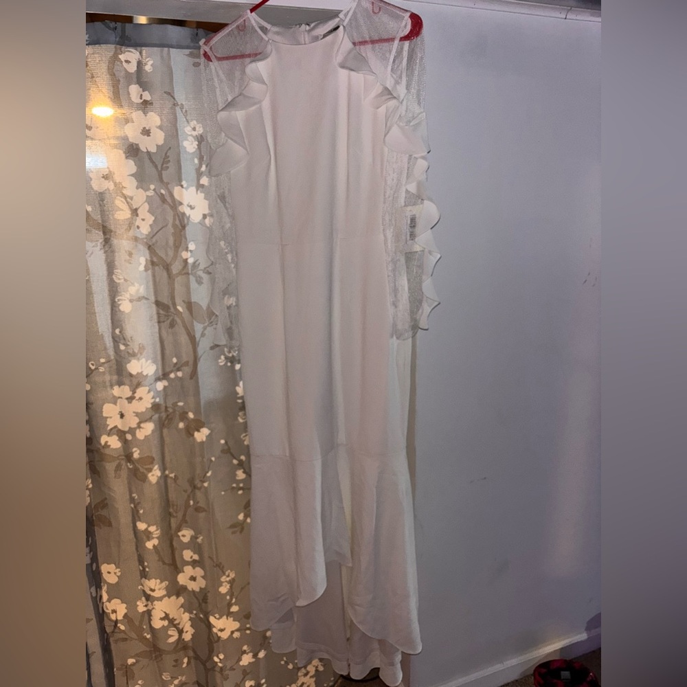 Chic White Dress with Sheer Ruffle Sleeve